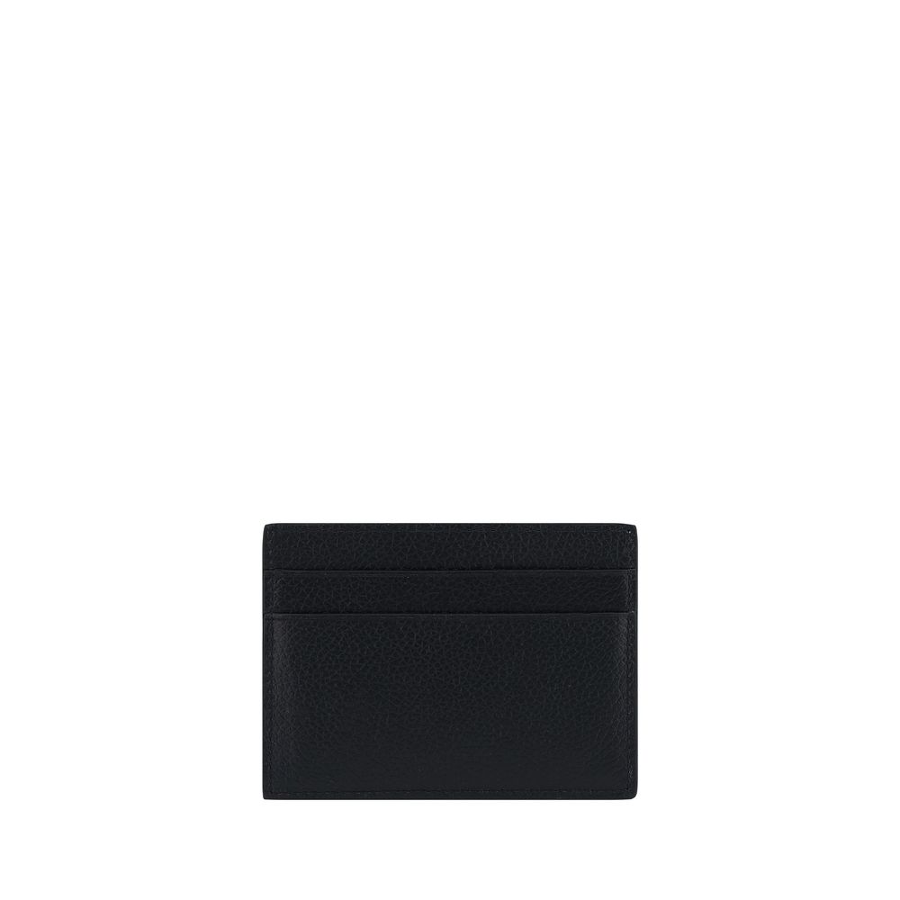 Black Calf Leather Bos Taurus WalletCalfskin Card Holder by Balenciaga, card slots on front and back, iconic brand monogram contrasting on front. Season: AW25 Dimension: 9×9 Composition: 100% Calf Leather Bos Taurus MADE IN ITALYBlack Calf Leather Bos Tau