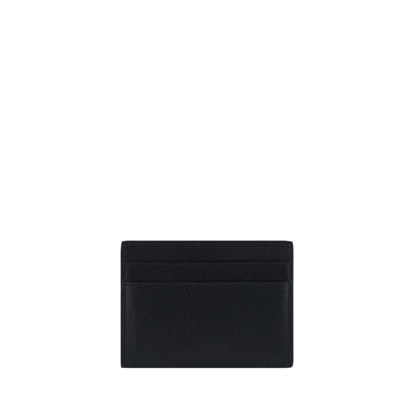 Black Calf Leather Bos Taurus WalletCalfskin Card Holder by Balenciaga, card slots on front and back, iconic brand monogram contrasting on front. Season: AW25 Dimension: 9×9 Composition: 100% Calf Leather Bos Taurus MADE IN ITALYBlack Calf Leather Bos Tau