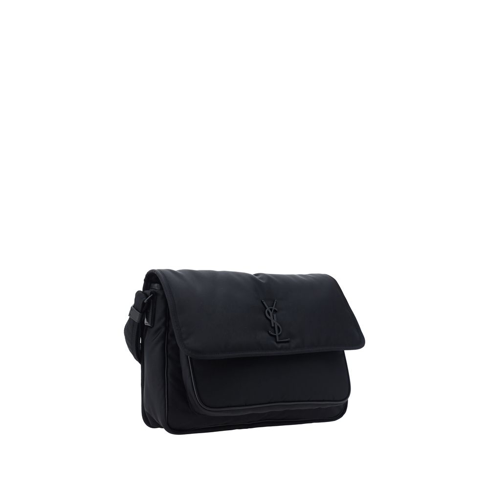 Black Polyamide Shoulder BagNiki Camera Shoulder Bag by Saint Laurent, front closure by magnetic flap, all-over padded and quilted chévron fabric design, embossed and matching iconic YSL brand logo plaque on front, triple interior compartment, removable a