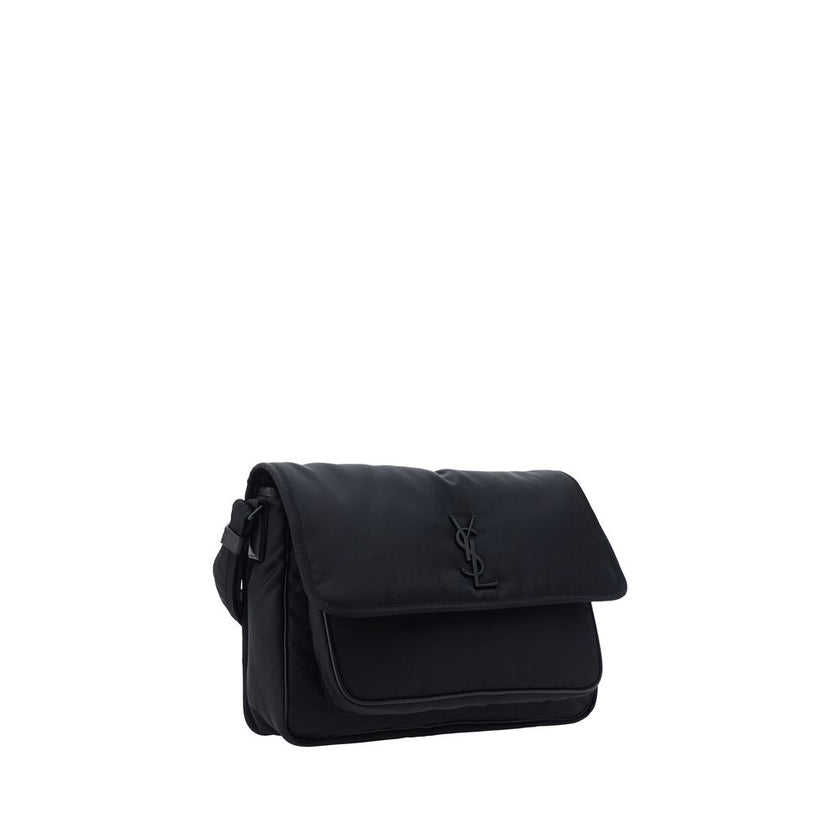Black Polyamide Shoulder BagNiki Camera Shoulder Bag by Saint Laurent, front closure by magnetic flap, all-over padded and quilted chévron fabric design, embossed and matching iconic YSL brand logo plaque on front, triple interior compartment, removable a