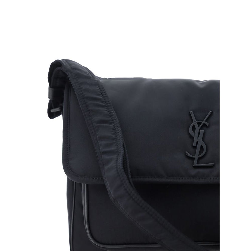 Black Polyamide Shoulder BagNiki Camera Shoulder Bag by Saint Laurent, front closure by magnetic flap, all-over padded and quilted chévron fabric design, embossed and matching iconic YSL brand logo plaque on front, triple interior compartment, removable a
