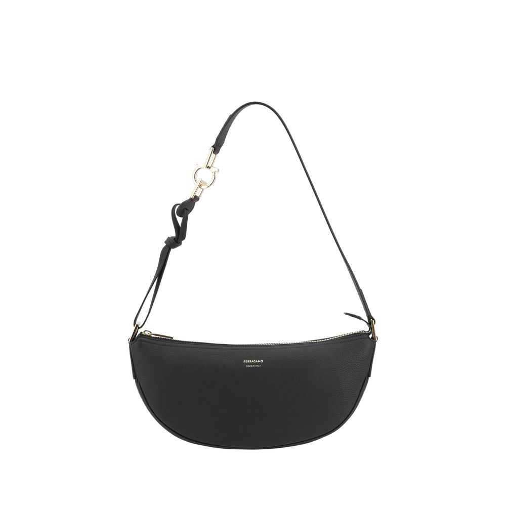 Black Calf Leather Bos Taurus Shoulder BagFerragamo’s Leather Hobo Shoulder Bag is an elegant and versatile accessory, featuring a half-moon design that enhances its soft, flowing silhouette. The adjustable shoulder strap allows you to easily adjust it to