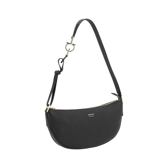 Black Calf Leather Bos Taurus Shoulder BagFerragamo’s Leather Hobo Shoulder Bag is an elegant and versatile accessory, featuring a half-moon design that enhances its soft, flowing silhouette. The adjustable shoulder strap allows you to easily adjust it to