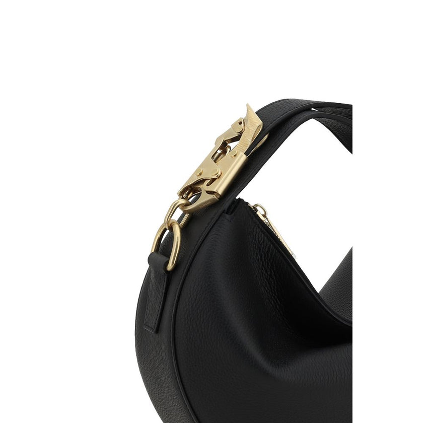 Leather HandbagBurberry’s Leather Handbag is a sleek and sophisticated design featuring the brand’s iconic details. The zippered top closure provides added security, while the adjustable flat handle offers versatility in wearing it. The Equestrian Knight