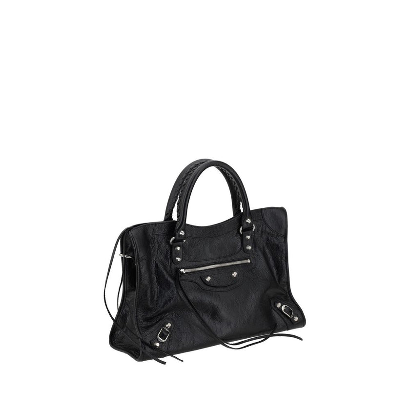 Black Lamb Ovis Aries Aries Shoulder BagBalenciaga’s Le City Medium Lambskin Handbag combines elegance and functionality. Made of soft lambskin leather, it features two hand-woven leather handles and an adjustable, removable shoulder strap for added versa