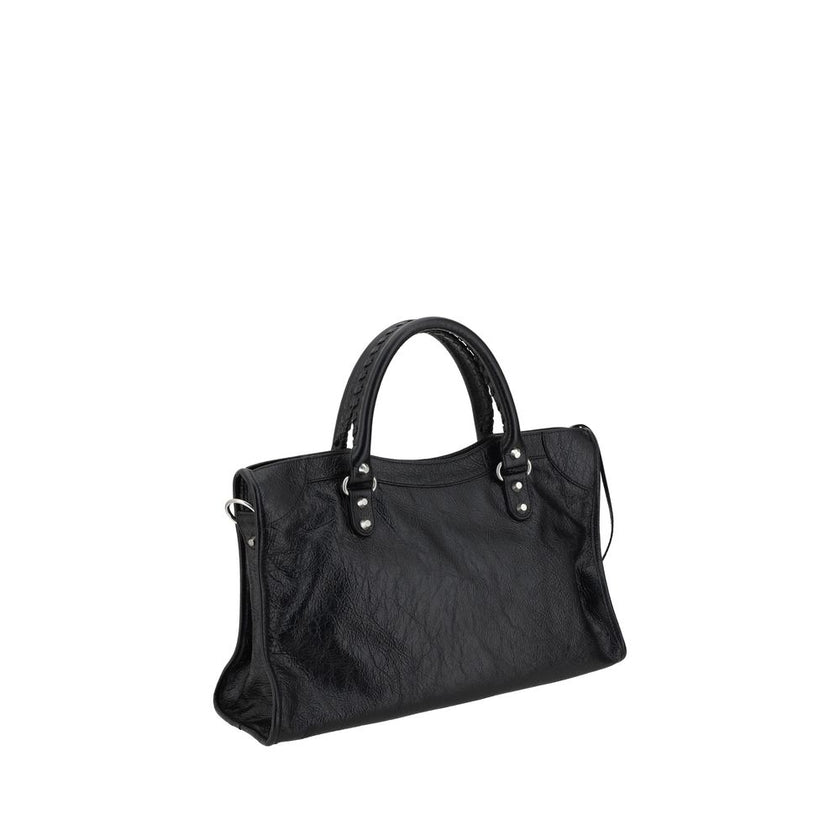 Black Lamb Ovis Aries Aries Shoulder BagBalenciaga’s Le City Medium Lambskin Handbag combines elegance and functionality. Made of soft lambskin leather, it features two hand-woven leather handles and an adjustable, removable shoulder strap for added versa