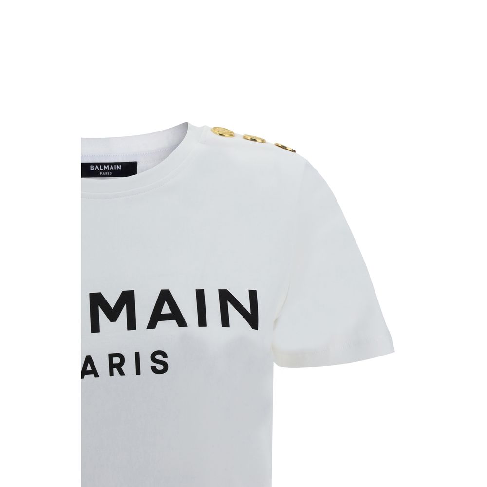 Logoed T-ShirtBalmain’s cotton T-Shirt combines the minimalism of a monochrome pattern with the elegance of the Maison’s iconic details. Made of soft cotton, it features a ribbed crew neck and a regular fit designed for everyday comfort. The design is enr