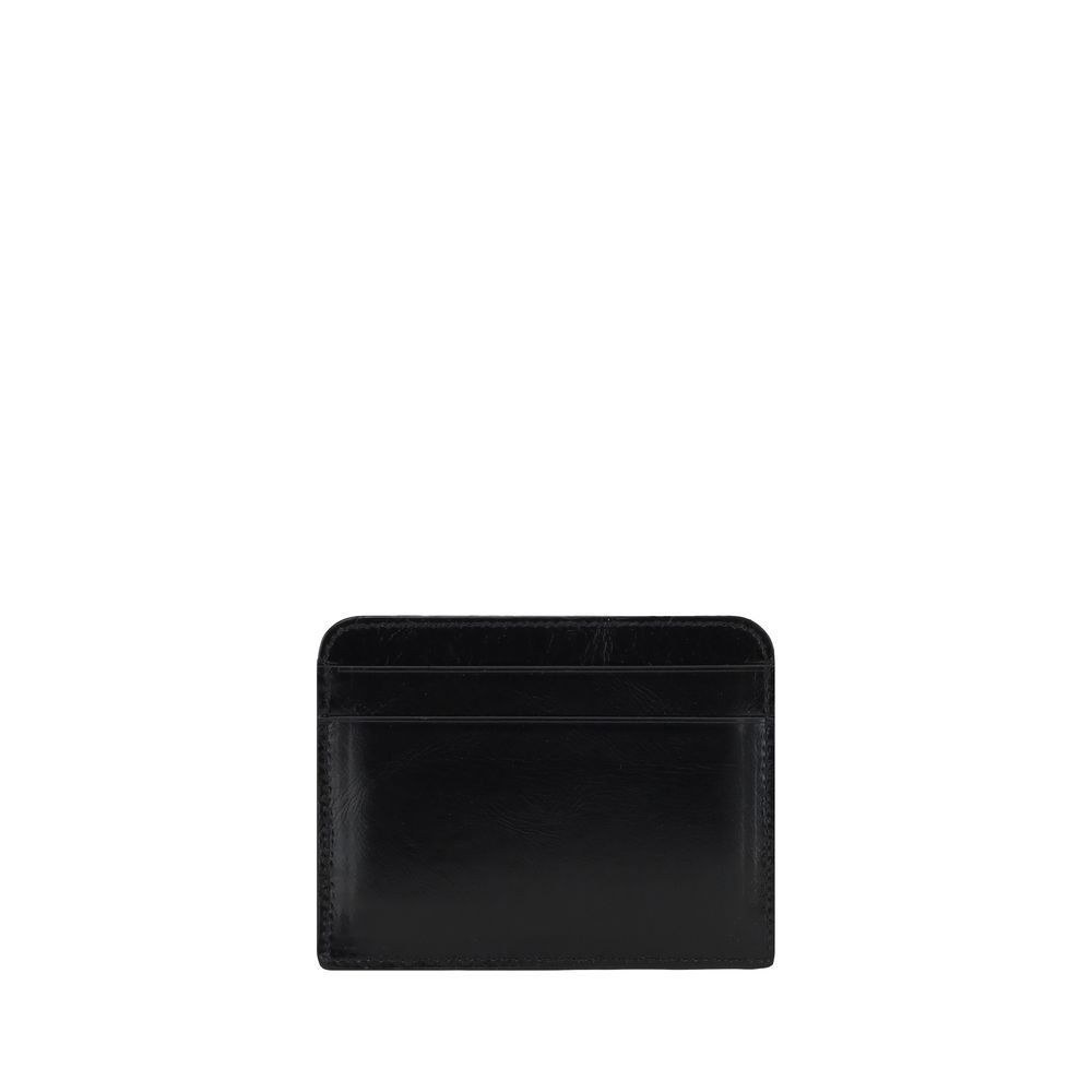 Black Calf Leather Bos Taurus WalletChloé’s leather logoed Card Holder is a stylish and practical accessory. It features card slots on the front and back, offering optimal functionality. The three-dimensional plaque with the brand’s iconic monogram applie