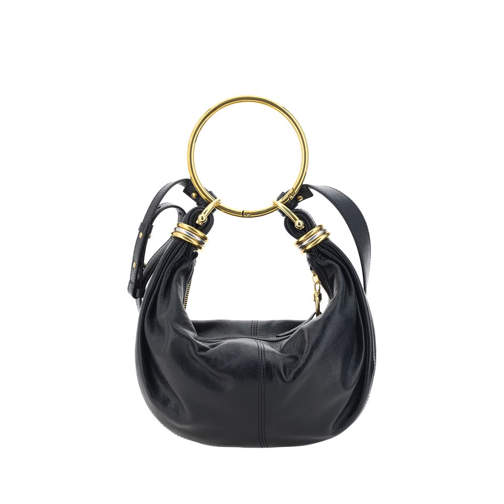 Black Calf Leather Bos Taurus HandbagLeather Bracelet Handbag by Chloé, a round brass handle, an adjustable flat shoulder strap and removable top zipper closure, single interior compartment. Season: AW25 Dimension: 32x32x10 Composition: 100% Calf Leather