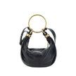 Black Calf Leather Bos Taurus HandbagLeather Bracelet Handbag by Chloé, a round brass handle, an adjustable flat shoulder strap and removable top zipper closure, single interior compartment. Season: AW25 Dimension: 32x32x10 Composition: 100% Calf Leather