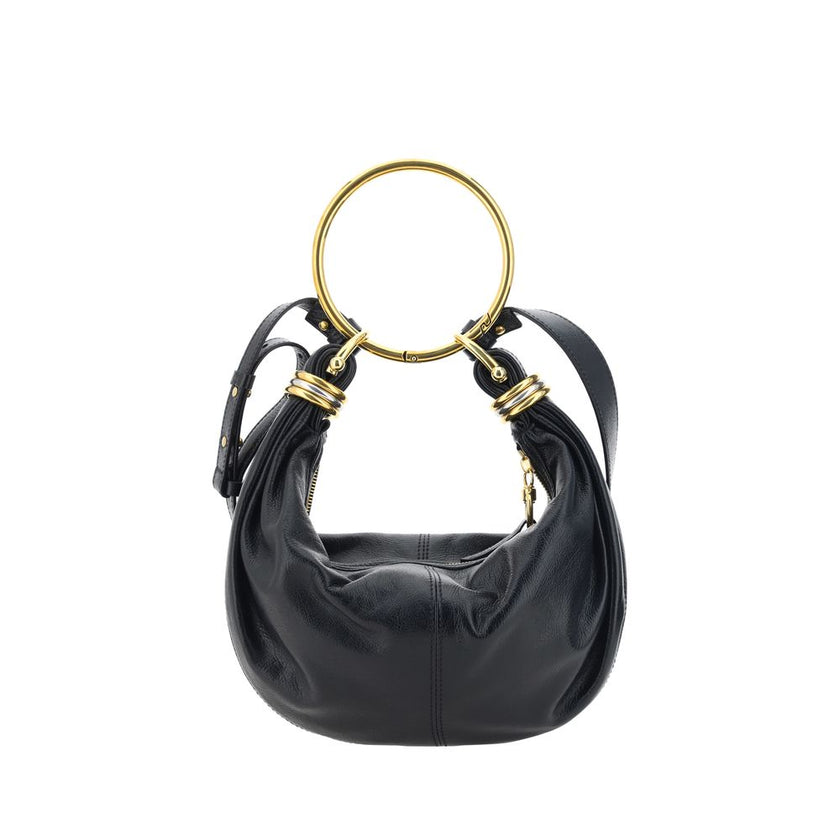 Black Calf Leather Bos Taurus HandbagLeather Bracelet Handbag by Chloé, a round brass handle, an adjustable flat shoulder strap and removable top zipper closure, single interior compartment. Season: AW25 Dimension: 32x32x10 Composition: 100% Calf Leather
