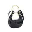 Black Calf Leather Bos Taurus HandbagLeather Bracelet Handbag by Chloé, a round brass handle, an adjustable flat shoulder strap and removable top zipper closure, single interior compartment. Season: AW25 Dimension: 32x32x10 Composition: 100% Calf Leather