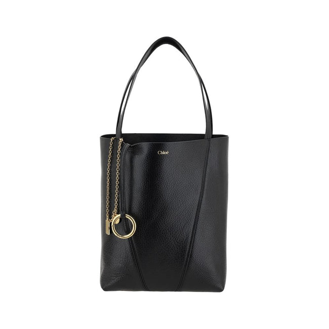 Black Calf Leather Bos Taurus Shoulder BagLeather Spin Shoulder Bag by Chloé is a refined and modern accessory featuring a sleek grained leather design. The two flat top handles offer a comfortable and practical grip, while the brand’s iconic monogram, pr