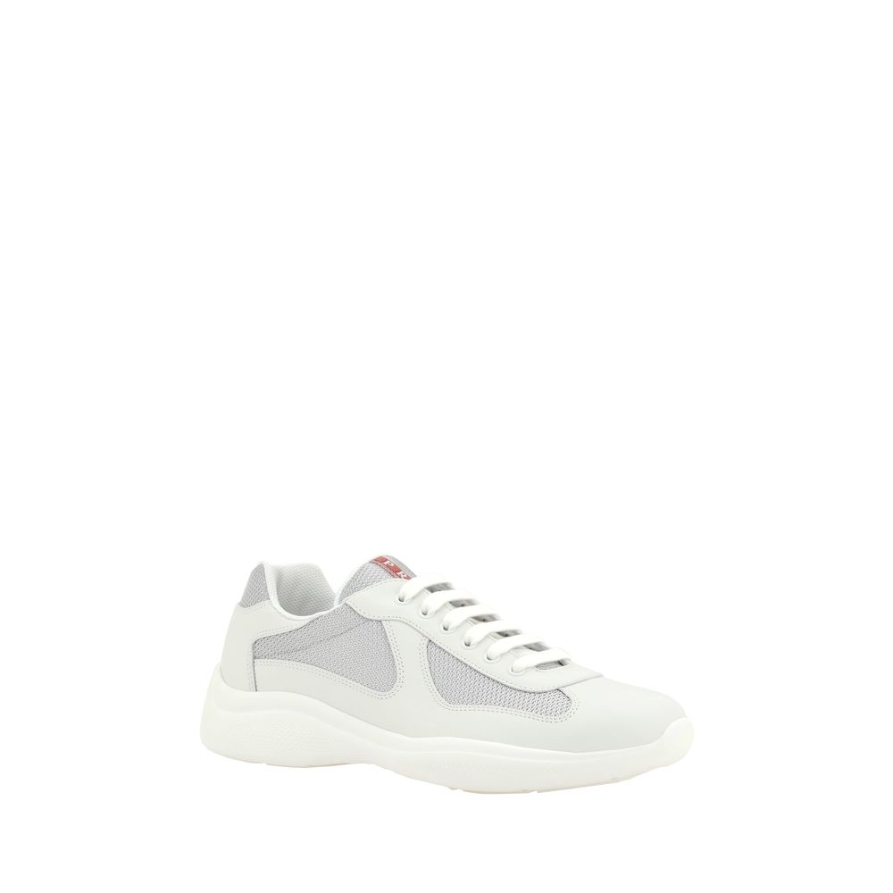 White Calf Leather Bos Taurus Low Top SneakersPrada’s America’s Sneakers are a modern and stylish interpretation of the classic sneaker, ideal for those seeking comfort without sacrificing style. Featuring a lace-up closure, they offer an adjustable and s