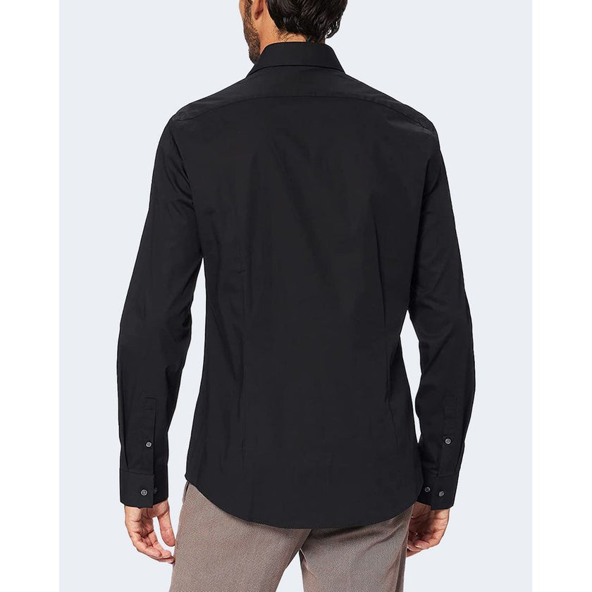 Black Cotton Dress ShirtDiscover the Calvin Klein K10K108229 long-sleeve shirt for men, crafted from stretch poplin for a slim fit that accentuates the male silhouette. This shirt is made from 100% high-quality cotton, ensuring comfort and breathability t