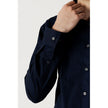 Blue Cotton Dress ShirtDiscover the long-sleeve men’s shirt by Calvin Klein, model POPLIN STRETCH SLIM. Made with a composition of 96% cotton and 4% elastane/lycra, this shirt offers exceptional comfort and a slim fit that enhances the male silhouette. Pe