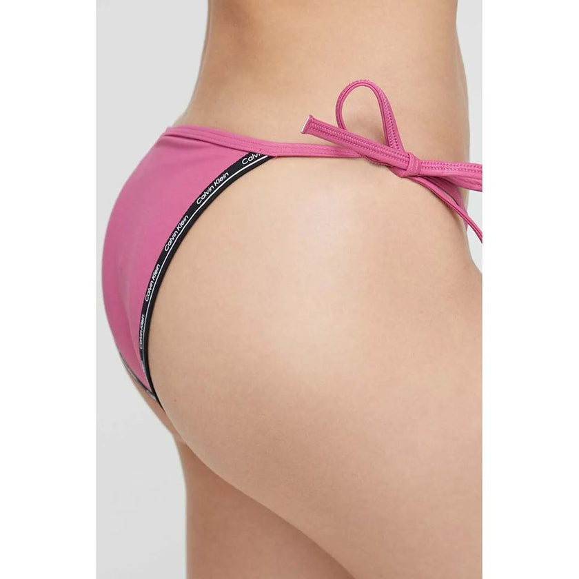 Pink Polyester Swim BriefsDiscover the String Side Tie bikini bottom for women by Calvin Klein Jeans, an essential piece for your summer wardrobe. Made from 78% polyamide and 22% elastane, this bottom offers a great fit and comfort, perfectly adapting to