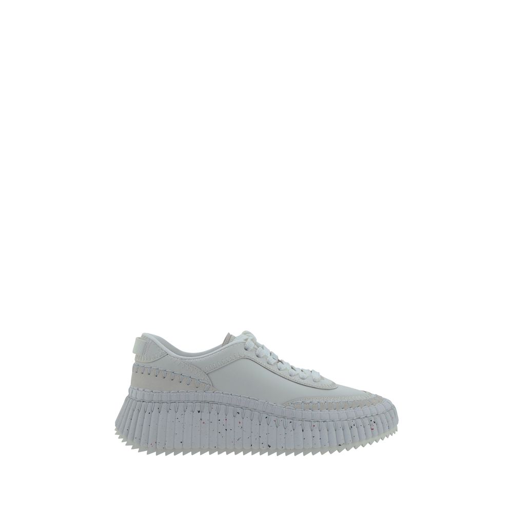 White Calf Leather Bos Taurus Platform SneakersCalfskin nama Sneakers by Chloé, lace-up front closure, mesh design on side panels, crater-effect structured platform sole, iconic brand monogram pressure-stamped at heel, logo-printed insole. Season: AW25 Co