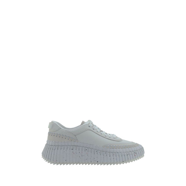 White Calf Leather Bos Taurus Platform SneakersCalfskin nama Sneakers by Chloé, lace-up front closure, mesh design on side panels, crater-effect structured platform sole, iconic brand monogram pressure-stamped at heel, logo-printed insole. Season: AW25 Co
