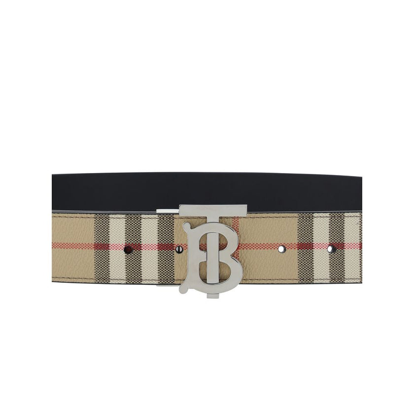 Archivio Check reversible BeltThe Burberry Reversible Belt features a double-sided design, offering two styling options: one side is plain and the other features the brand’s iconic Archive Check. The gold-plated buckle, featuring the brand’s logo, adds a