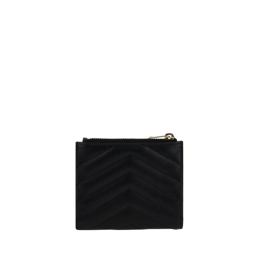 Black Calf Leather Bos Taurus WalletCalfskin Wallet by Saint Laurent, matelassé design, embossed iconic monogram plaque on front, snap-button closure, interior card slot and bill compartment, zippered slot pocket on top. Season: AW25 Dimension: 12x12x2 Co
