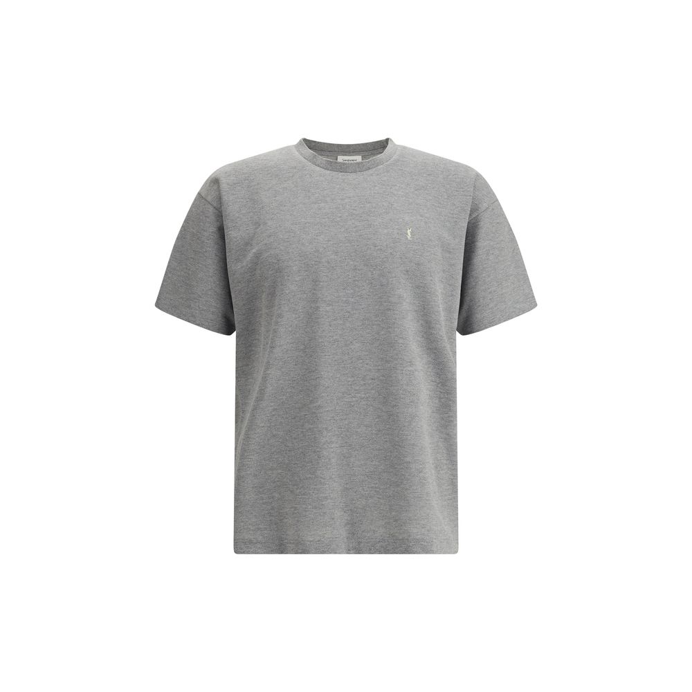 Grey Cotton Oversized T-shirtSaint Laurent’s oversized T-shirt is a casual yet sophisticated piece with a ribbed crew neck for comfort. The brand’s iconic logo, stitched on the front, adds a touch of understated elegance. The mélange pattern gives a sligh