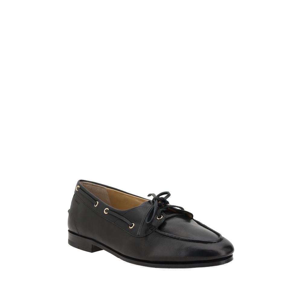 Black Calf Leather Bos Taurus Slip-On LoafersPathy leather Loafers by Bally feature an almond toe and a boat-inspired design, with a leather ribbon that ties at the front, adding an elegant and refined touch. The leather block heel offers stability and co
