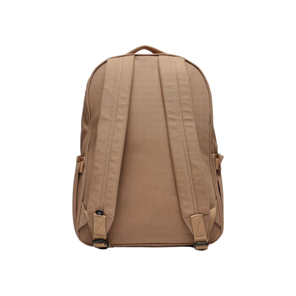 Beige Recycled Polyester BackpackDiscover the Calvin Klein SPORT ESSENTIALS CAMPUS backpack, an essential accessory for the modern man. Made from 100% recycled polyester, this backpack combines sustainability with style. The sleek design features a zipper