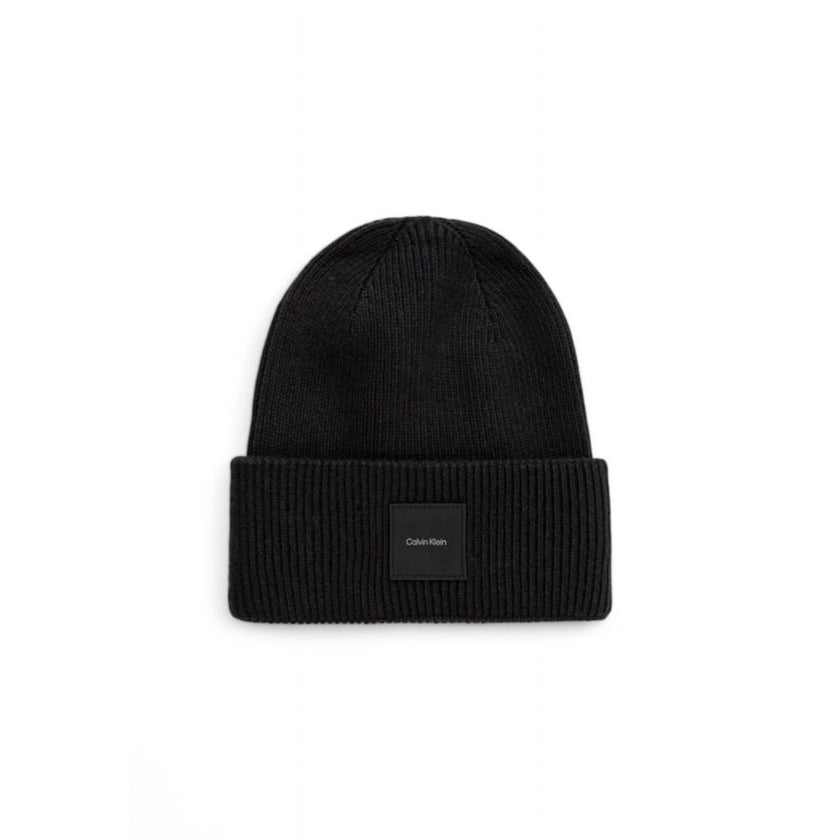 Black Organic Cotton Cap (Baseball Hat)Discover the Calvin Klein FINE RIB BEANIE men’s hat, an elegant and versatile accessory perfect for completing your winter look. Made with a high-quality composition that includes 55% organic cotton, 34% polyester, 8