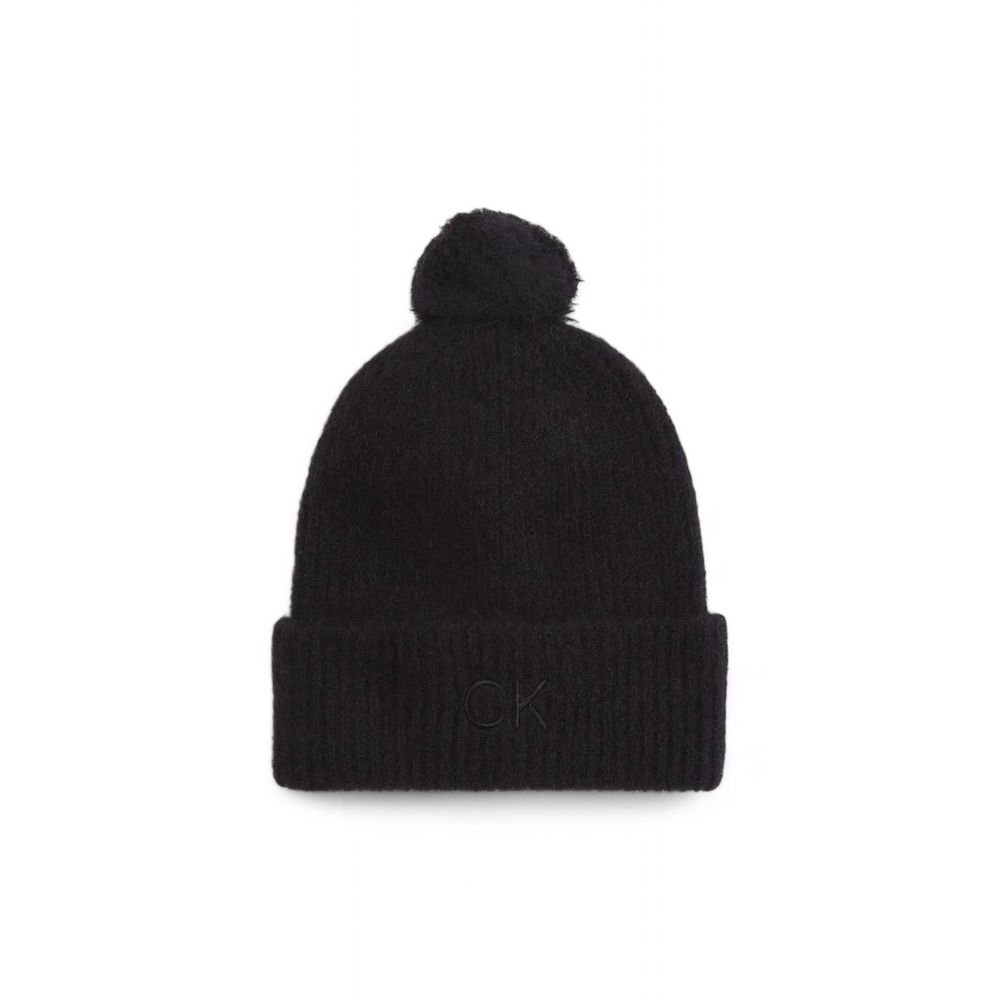 Black Alpaca Leather Cap (Baseball Hat)The Calvin Klein CK EMBROIDERY AIRY POMPOM BEANIE women’s hat is an elegant and warm accessory, perfect for cold days. Made from high-quality materials, including 48% alpaca, 28% polyester, 21% wool, and 3% elastane/