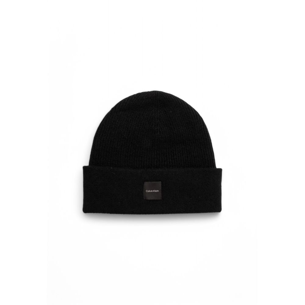 Black Cashmere Caps Baseball HatThe Calvin Klein chunky open rib beanie is the perfect accessory to complete your winter look. Made from 100% cashmere, it provides an unparalleled softness and warmth. The open rib design adds a touch of elegance and moder