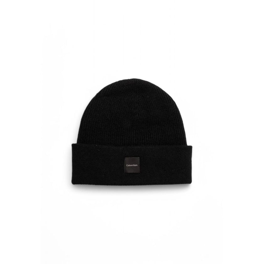 Black Cashmere Caps Baseball HatThe Calvin Klein chunky open rib beanie is the perfect accessory to complete your winter look. Made from 100% cashmere, it provides an unparalleled softness and warmth. The open rib design adds a touch of elegance and moder
