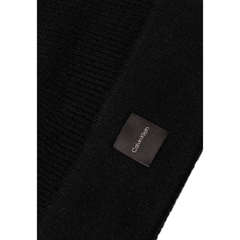 Black Cashmere Caps Baseball HatThe Calvin Klein chunky open rib beanie is the perfect accessory to complete your winter look. Made from 100% cashmere, it provides an unparalleled softness and warmth. The open rib design adds a touch of elegance and moder