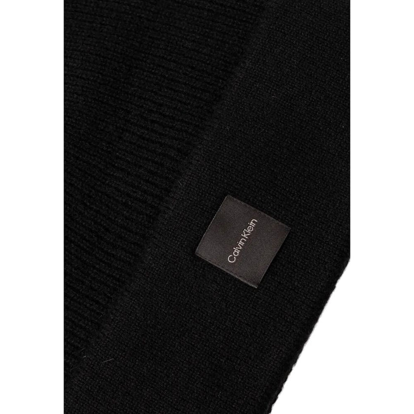 Black Cashmere Caps Baseball HatThe Calvin Klein chunky open rib beanie is the perfect accessory to complete your winter look. Made from 100% cashmere, it provides an unparalleled softness and warmth. The open rib design adds a touch of elegance and moder