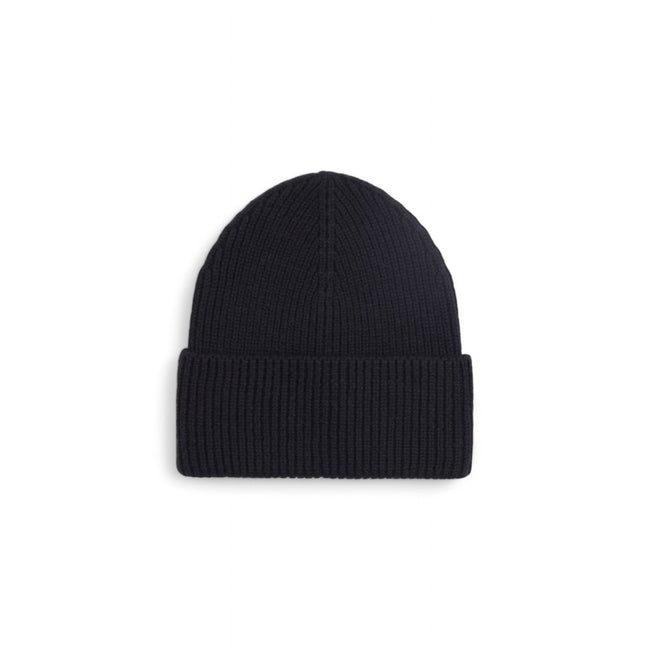 Black Wool Cap (Baseball Hat)Discover the Calvin Klein CK METAL CHUNKY RIB BEANIE, a stylish and versatile accessory for your winter wardrobe. Made from high-quality materials, 90% wool and 10% cashmere, this beanie offers exceptional softness and warmth,