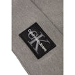 Gray Cotton Cap (Baseball Hat)The MONO LOGO PATCH BEANIE WARM by Calvin Klein Jeans is the perfect accessory to complete your winter look. Made from a blend of 50% cotton and 50% acrylic, this beanie provides a warm and comfortable fit, ideal for tackling