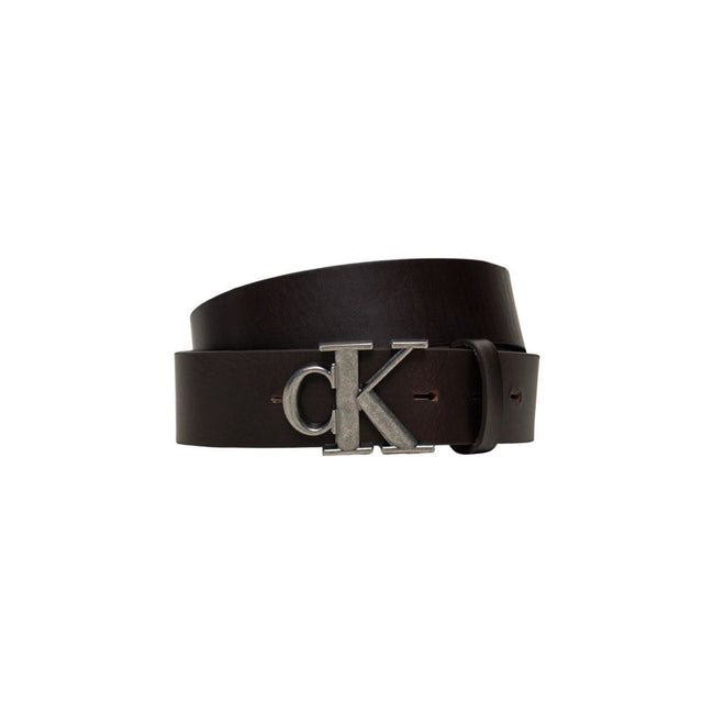 Brown Leather Regular BeltThe Calvin Klein Jeans ROUND MONO PLAQUE LTHR 35MM belt is a stylish and versatile accessory, made from 100% high-quality leather. Its refined and minimalist design makes it perfect for completing any look, whether casual or form
