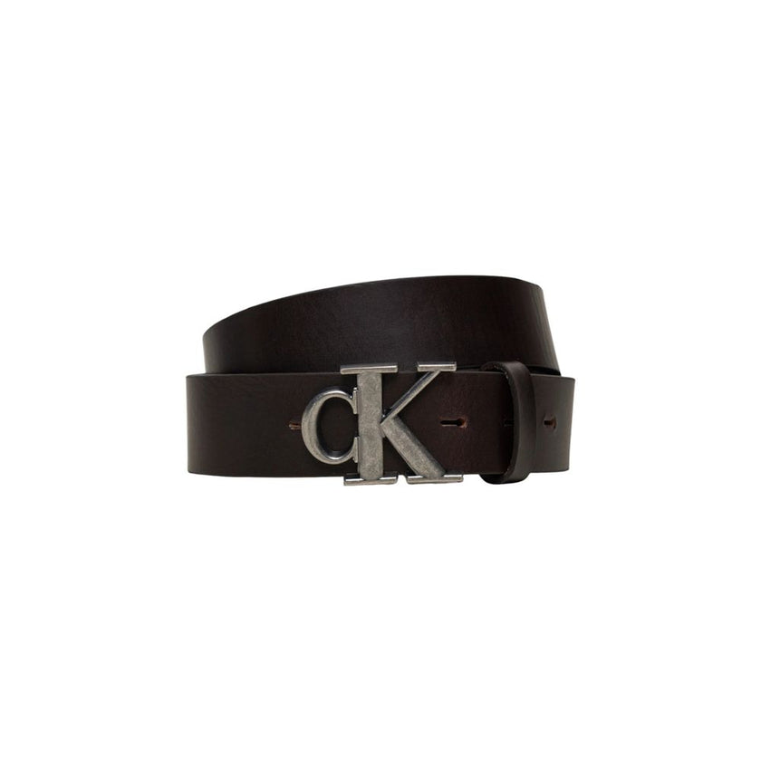 Brown Leather Regular BeltThe Calvin Klein Jeans ROUND MONO PLAQUE LTHR 35MM belt is a stylish and versatile accessory, made from 100% high-quality leather. Its refined and minimalist design makes it perfect for completing any look, whether casual or form