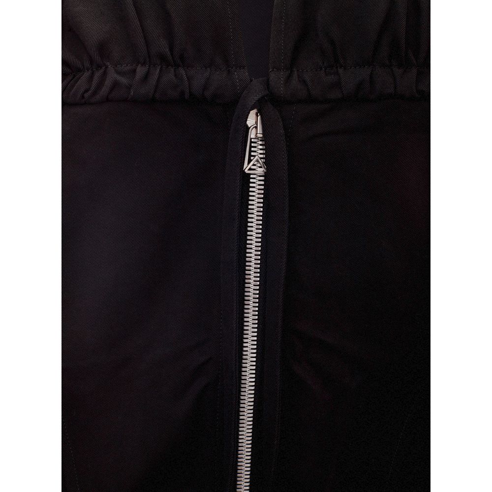 Elegant Black Viscose Dress EssentialsDiscover the embodiment of sophistication with this premium black viscose dress, expertly crafted for the modern woman. Both timeless and contemporary, this piece is a testament to the distinguished style synonymous w