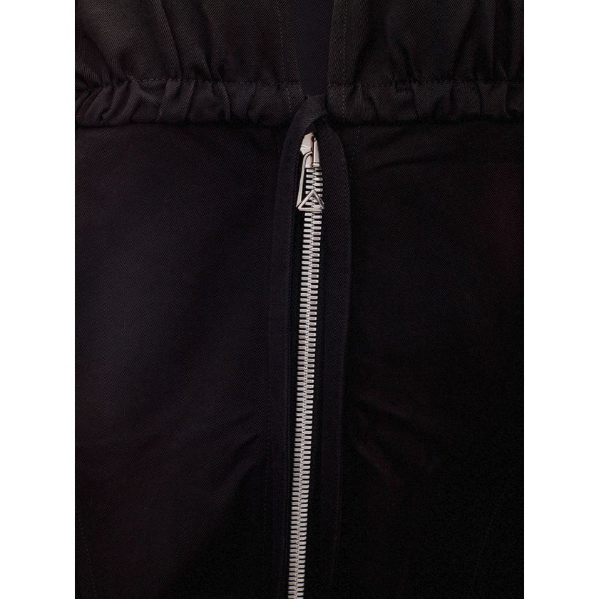 Elegant Black Viscose Dress EssentialsDiscover the embodiment of sophistication with this premium black viscose dress, expertly crafted for the modern woman. Both timeless and contemporary, this piece is a testament to the distinguished style synonymous w