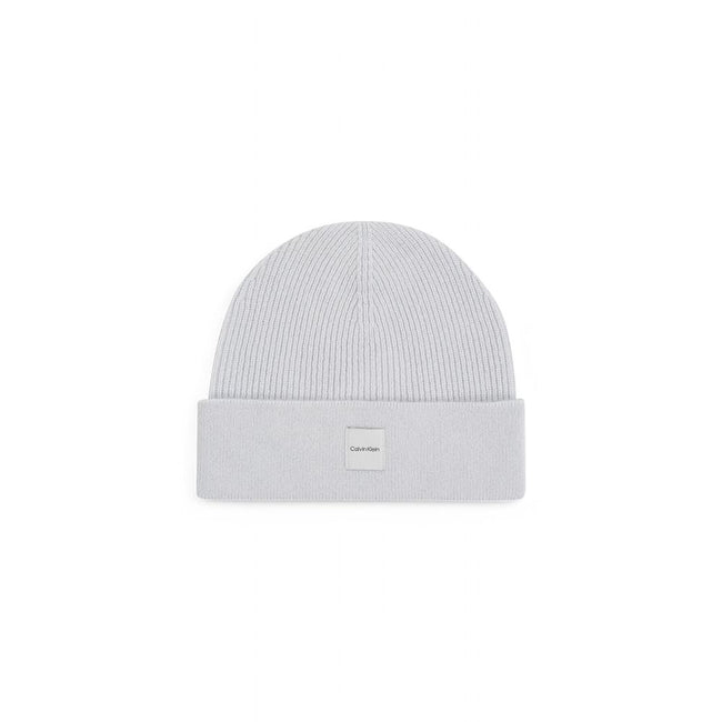 Gray Cashmere Caps Baseball HatThe Calvin Klein chunky open rib beanie is the perfect accessory to complete your winter look. Made from 100% cashmere, it provides an unparalleled softness and warmth. The open rib design adds a touch of elegance and modern