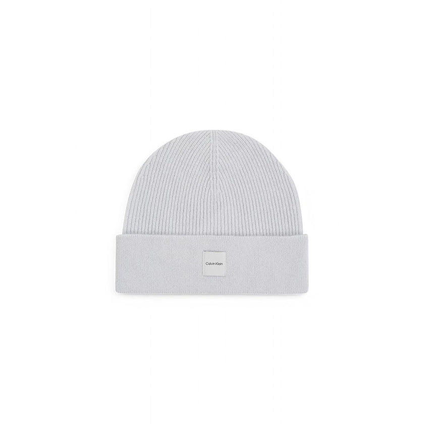 Gray Cashmere Caps Baseball HatThe Calvin Klein chunky open rib beanie is the perfect accessory to complete your winter look. Made from 100% cashmere, it provides an unparalleled softness and warmth. The open rib design adds a touch of elegance and modern