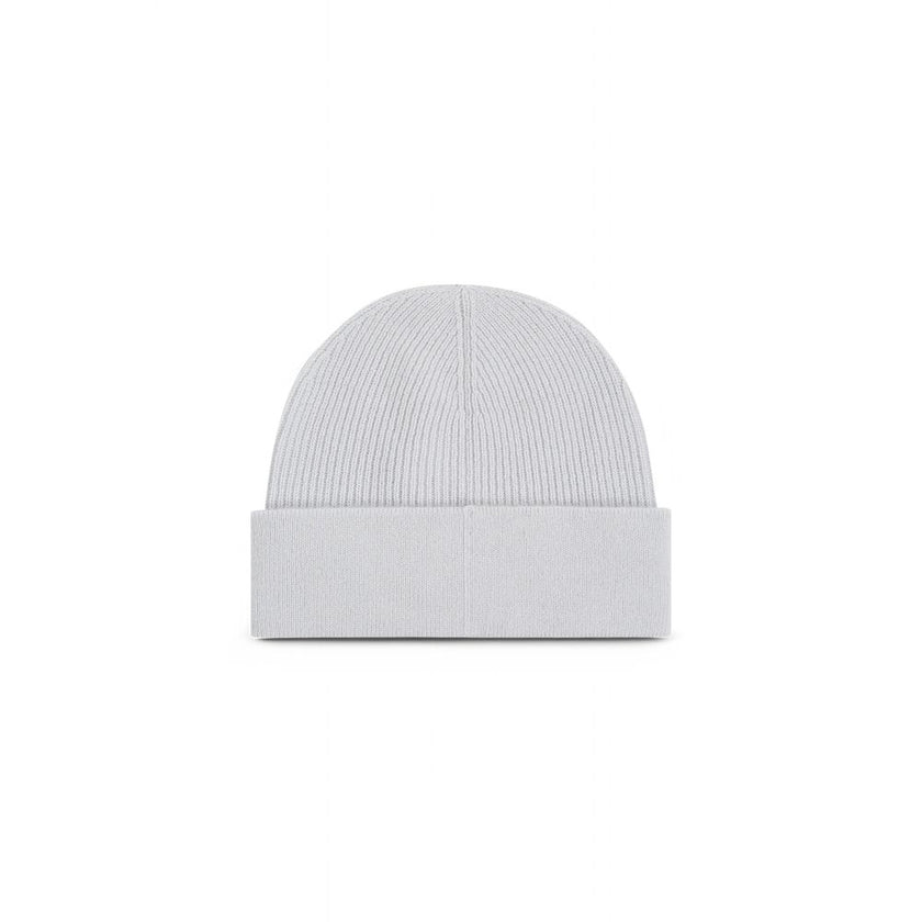 Gray Cashmere Caps Baseball HatThe Calvin Klein chunky open rib beanie is the perfect accessory to complete your winter look. Made from 100% cashmere, it provides an unparalleled softness and warmth. The open rib design adds a touch of elegance and modern