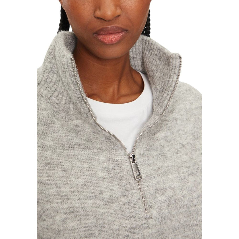 Gray Polyester CardiganDiscover the Calvin Klein Jeans TEXTURED HALF ZIP SW J20J224238 women’s cardigan, a piece that combines elegance and comfort. Made from a high-quality blend, the cardigan consists of 58% polyester, 20% alpaca, 20% wool, and 2% elast