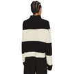 Black And White Cotton SweatshirtDiscover the chunky loose sweater by Calvin Klein Jeans, an essential piece for your winter wardrobe. Made from 100% cotton, this sweater offers exceptional comfort and a loose fit that flatters any silhouette. The striped