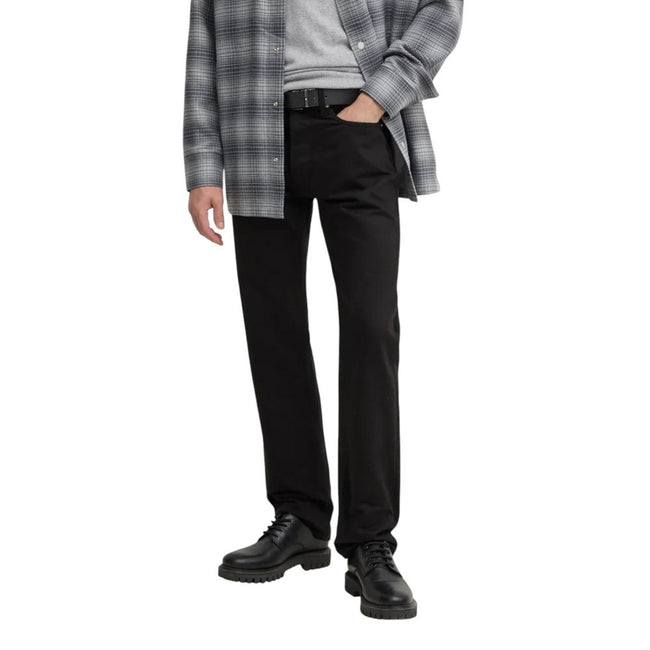 Black Cotton Relaxed Fit JeanDiscover the Calvin Klein Jeans STANDARD STRAIGHT J30J325966 regular/loose fit jeans for men, made from 100% cotton for optimal comfort. These jeans feature a straight and relaxed fit, perfect for any occasion, from leisure ti