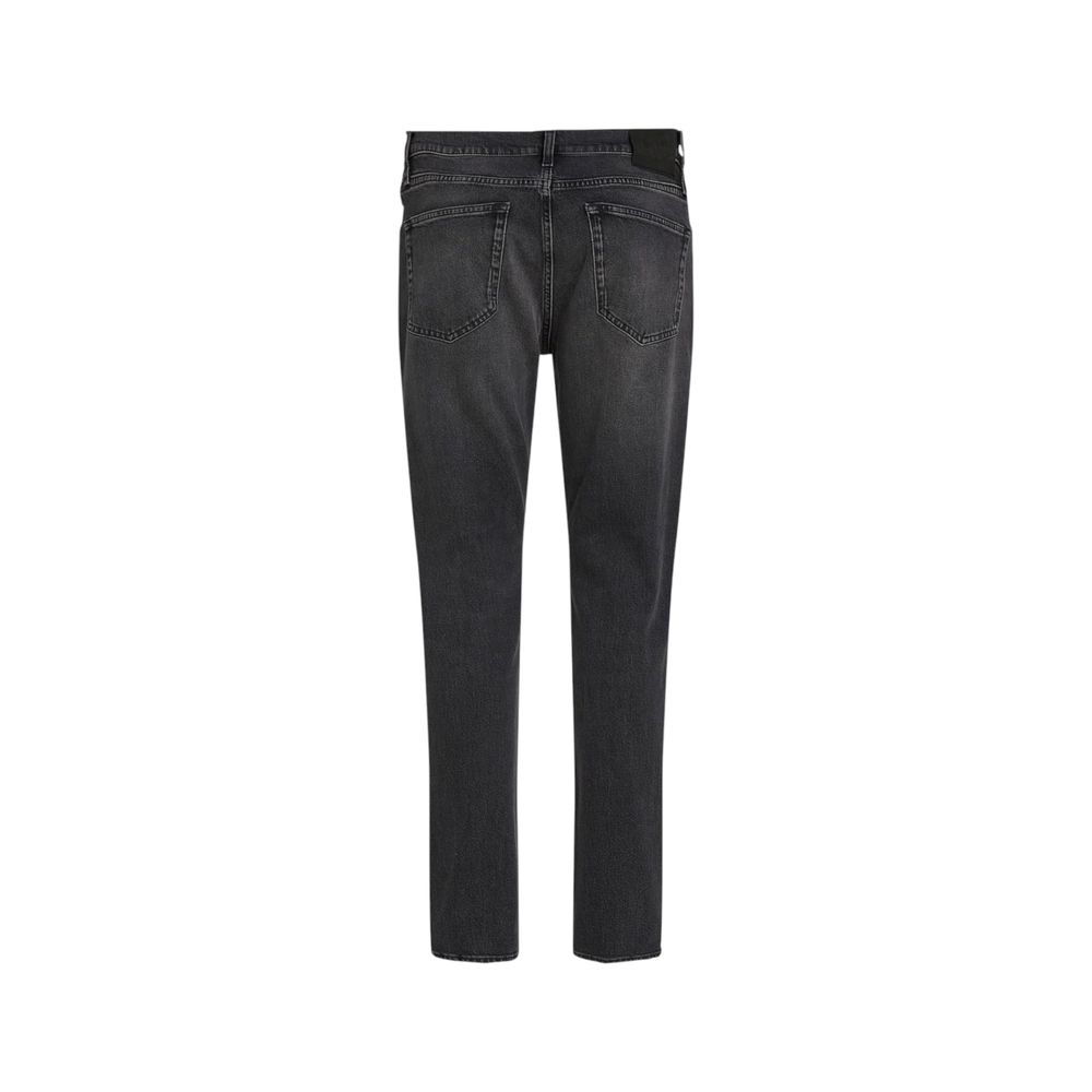 Black Cotton Skinny JeanDiscover the Calvin Klein Jeans SLIM STRAIGHT J30J326834 men’s slim jeans, an essential piece for your wardrobe. Made from 99% cotton and 1% elastane/lycra, these jeans offer a comfortable fit with a slight stretch that ensures fre