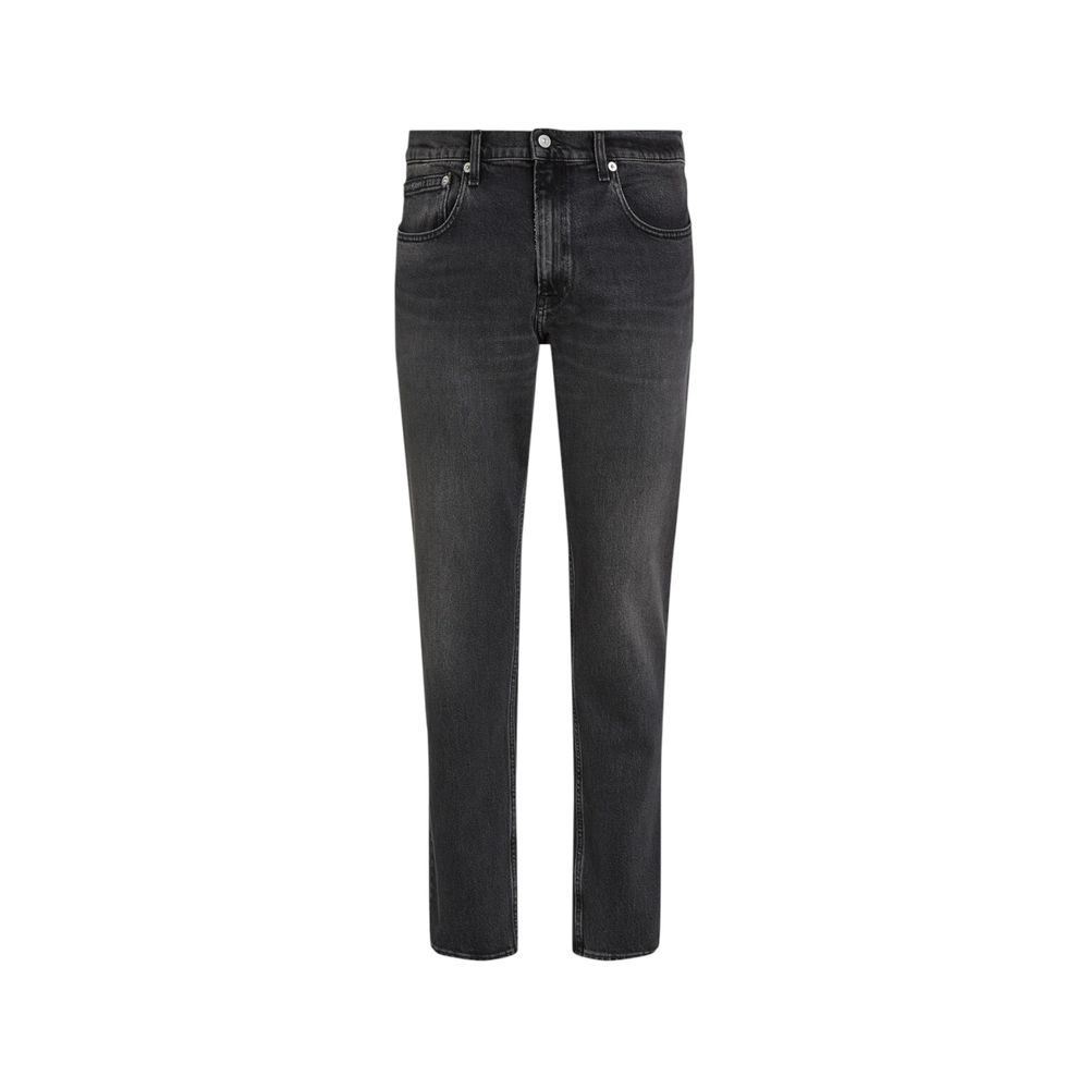 Black Cotton Skinny JeanDiscover the Calvin Klein Jeans SLIM STRAIGHT J30J326834 men’s slim jeans, an essential piece for your wardrobe. Made from 99% cotton and 1% elastane/lycra, these jeans offer a comfortable fit with a slight stretch that ensures fre