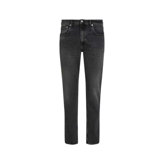 Black Cotton Skinny JeanDiscover the Calvin Klein Jeans SLIM STRAIGHT J30J326834 men’s slim jeans, an essential piece for your wardrobe. Made from 99% cotton and 1% elastane/lycra, these jeans offer a comfortable fit with a slight stretch that ensures fre