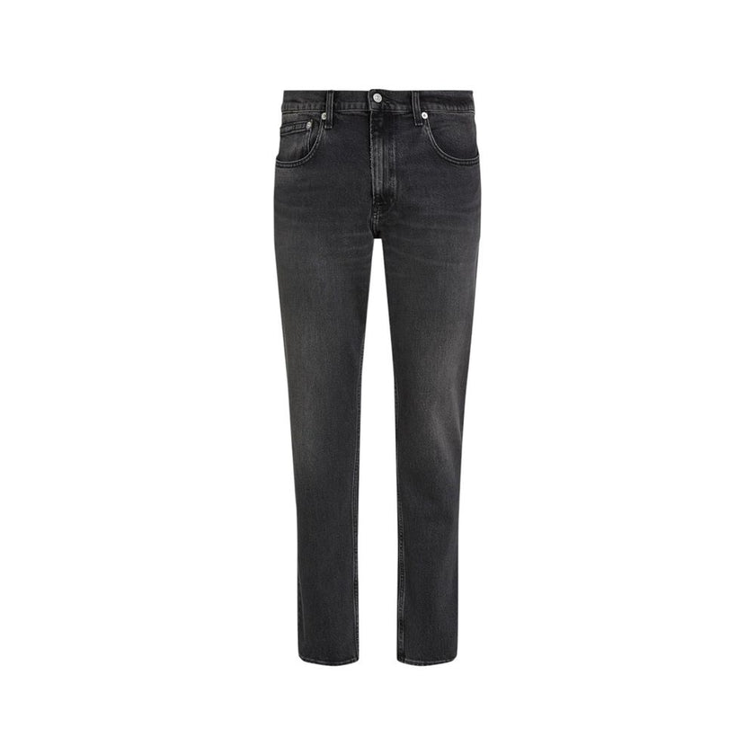 Black Cotton Skinny JeanDiscover the Calvin Klein Jeans SLIM STRAIGHT J30J326834 men’s slim jeans, an essential piece for your wardrobe. Made from 99% cotton and 1% elastane/lycra, these jeans offer a comfortable fit with a slight stretch that ensures fre